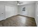 Bedroom with ceiling fan, closet, and a window at 1522 Goodwin Rd, Durham, NC 27712