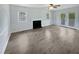 Living room with fireplace and sliding doors at 1522 Goodwin Rd, Durham, NC 27712