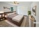 Staged main bedroom with closet and natural light at 1522 Goodwin Rd, Durham, NC 27712