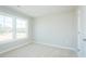 Neutral bedroom with carpet, a double-hung window, and a closet at 160 Tupelo Dr, Spring Hope, NC 27882