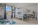 Bright bedroom featuring bunk beds, large windows, and decor at 168 Amber Acorn Ave, Raleigh, NC 27603