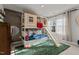 Fun ' bedroom with house-style bunk bed and slide at 168 Amber Acorn Ave, Raleigh, NC 27603