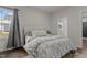 Cozy bedroom with a comfortable bed, soft linens, and view of the ensuite bathroom at 168 Amber Acorn Ave, Raleigh, NC 27603