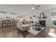 Open concept living room and kitchen area with hardwood floors and modern finishes at 168 Amber Acorn Ave, Raleigh, NC 27603