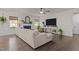 Cozy living room with a fireplace, large TV, and comfortable sectional sofa at 168 Amber Acorn Ave, Raleigh, NC 27603