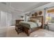 Comfortable main bedroom with elegant decor and a tray ceiling at 168 Amber Acorn Ave, Raleigh, NC 27603