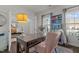 Bright home office featuring natural light, custom shelving, and a work desk at 168 Amber Acorn Ave, Raleigh, NC 27603
