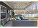 Covered outdoor patio with comfortable seating, string lights, and a view of the backyard at 168 Amber Acorn Ave, Raleigh, NC 27603