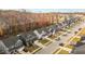 Street view featuring a row of single-Gathering homes, well-maintained lawns, and community atmosphere at 168 Amber Acorn Ave, Raleigh, NC 27603