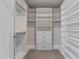 Spacious walk-in closet featuring custom shelving for organization at 168 Amber Acorn Ave, Raleigh, NC 27603