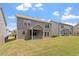 A spacious backyard featuring a well-maintained lawn and a screened-in porch at 170 Creekhaven Dr, Angier, NC 27501