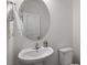 Bathroom featuring a white vanity, large mirror, and modern sink at 170 Creekhaven Dr, Angier, NC 27501