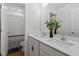 Bright bathroom features a double vanity with white countertops and modern fixtures at 170 Creekhaven Dr, Angier, NC 27501