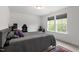 Bedroom with carpet, neutral walls and a gray bed at 170 Creekhaven Dr, Angier, NC 27501