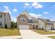 Charming two-story home with a two-car garage and well-manicured lawn at 170 Creekhaven Dr, Angier, NC 27501