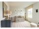 Bedroom with a crib, dresser, decor, and a window with sunlight at 171 Alice Trace Place, Angier, NC 27501