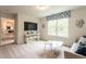 A bonus room with neutral colored carpet and walls, and a ceiling fan at 171 Alice Trace Place, Angier, NC 27501