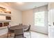 Bright room with a round table, carpet flooring, and window at 171 Alice Trace Place, Angier, NC 27501