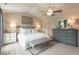 Inviting main bedroom showcasing neutral decor, carpet, and a ceiling fan at 171 Alice Trace Place, Angier, NC 27501