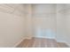 Empty walk-in closet with shelving and carpet flooring for clothing storage at 171 Alice Trace Place, Angier, NC 27501