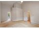 Spacious bedroom features a vaulted ceiling and access to the sunroom at 1725 Briarforest Pl, Raleigh, NC 27615