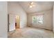 Bedroom features vaulted ceilings and natural light at 1725 Briarforest Pl, Raleigh, NC 27615