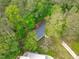 Overhead view of the home nestled among mature trees and greenery at 1805 Holly St, Apex, NC 27502
