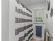 Neat bathroom featuring a striped shower curtain, window, towel rack and clean design at 1805 Holly St, Apex, NC 27502