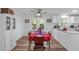 Dining area featuring an elegant table setting, French doors, and hardwood flooring at 1805 Holly St, Apex, NC 27502