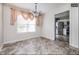 Bright dining area offering ample space for entertaining and a view into the kitchen at 1808 Betry Pl, Raleigh, NC 27603