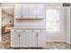 Bright, renovated kitchen offering ample storage and countertop space at 1808 Betry Pl, Raleigh, NC 27603