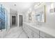 Beautiful bathroom with a walk-in shower and double vanity with marble countertops at 1820 Park Dr, Raleigh, NC 27605