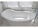 Close up of bathroom featuring an elegant stand alone tub and refined finishes at 1820 Park Dr, Raleigh, NC 27605