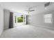 Spacious bedroom with a large window and neutral carpeting at 1820 Park Dr, Raleigh, NC 27605