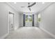 Bedroom featuring neutral walls, patterned carpet, ceiling fan, and 2 windows at 1820 Park Dr, Raleigh, NC 27605
