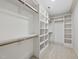 Large, well-organized walk-in closet with built-in shelves and ample storage space at 1820 Park Dr, Raleigh, NC 27605