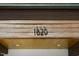 Close-up of the house number '1620' displayed prominently on a modern wood surface at 1820 Park Dr, Raleigh, NC 27605