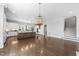 Open kitchen with a center island, stainless steel appliances, and access to living spaces at 1820 Park Dr, Raleigh, NC 27605