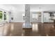 Elegant living room with marble fireplace, hardwood floors, and abundant natural light at 1820 Park Dr, Raleigh, NC 27605