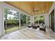 Outdoor living area with natural views, comfortable seating, and wood ceilings at 1820 Park Dr, Raleigh, NC 27605