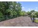 Rooftop deck featuring tile flooring, metal railings, and neighborhood views at 1820 Park Dr, Raleigh, NC 27605