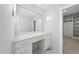 Vanity area with a large mirror and custom drawers at 1820 Park Dr, Raleigh, NC 27605