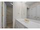 Bathroom featuring a white vanity with gold fixtures and access to a toilet room at 2037 Gurney Ct, Burlington, NC 27215