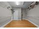 Walk-in closet with built-in shelving and hardwood floors at 2037 Gurney Ct, Burlington, NC 27215