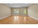Spacious living room with hardwood floors, recessed lighting, and multiple windows at 2037 Gurney Ct, Burlington, NC 27215