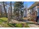 Outdoor patio with seating and a grill, perfect for entertaining in the landscaped backyard at 205 Coachman Dr, Garner, NC 27529