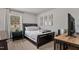 Bedroom with neutral paint, plush carpet, window for natural light, and ample space at 205 Coachman Dr, Garner, NC 27529