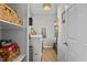 Well-organized laundry room and pantry with built-in shelving, updated appliances, and plenty of storage at 205 Coachman Dr, Garner, NC 27529