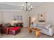 Spacious living room with hardwood floors, decorative lighting, and comfortable seating at 205 Coachman Dr, Garner, NC 27529
