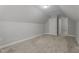 Comfortable bedroom features neutral colors, plush carpeting and closet access at 2057 Big Falls Dr, Wendell, NC 27591